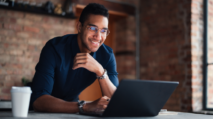 Man working on a laptop while exploring responsible AI concepts